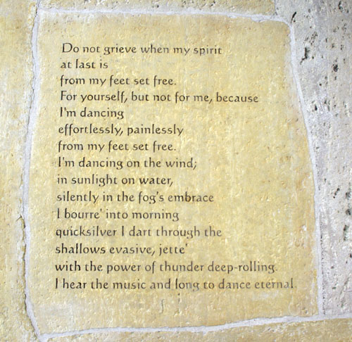 A poem, In Passing, carved into the stone floor of the Reflection Space